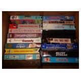 Box of VHS including Disney and some 8 track tapes Box of VHS including Disney and some 8 track tapes