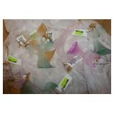 Glass angels, porcelain and ceramic flowers, flower wreath Glass angels, porcelain and ceramic flowers, flower wreath
