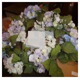 Glass angels, porcelain and ceramic flowers, flower wreath Glass angels, porcelain and ceramic flowers, flower wreath