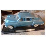 Tucker die cast car, doll, night light, infuser, slide viewer Tucker die cast car, doll, night light, infuser, slide viewer