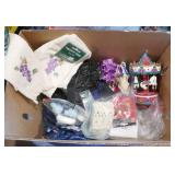 Box of misc - towels, carousel, outlets, candle, décor, led butterfly, coffee cup, curtains Box of misc - towels, carousel, outlets, candle, décor, led butterfly, coffee cup, curtains