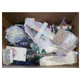 Box of misc - towels, carousel, outlets, candle, décor, led butterfly, coffee cup, curtains Box of misc - towels, carousel, outlets, candle, décor, led butterfly, coffee cup, curtains