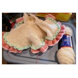 Box of yarn and knitted doll dress etc Box of yarn and knitted doll dress etc