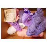 Box of yarn and knitted doll dress etc Box of yarn and knitted doll dress etc