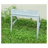 Two metal sawhorses Two metal sawhorses