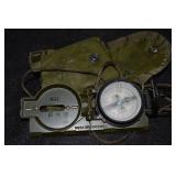 VINTAGE MILITARY COMPASSES AND MEDAL.