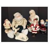 Variety of Decorative Santa Dolls and Figurines