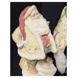Variety of Decorative Santa Dolls and Figurines