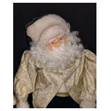 Variety of Decorative Santa Dolls and Figurines