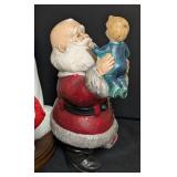 Variety of Decorative Santa Dolls and Figurines