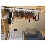 Closet Organizing Lot with Wooden Hangers and Storage Bins