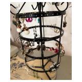 Rotating Jewelry Stand with Assorted Earrings and Hoops Collection