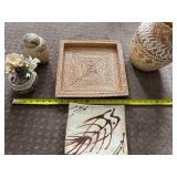 Decorative Basket and Pottery Collection Including Woven Vessels, Painted Plate, and Faux Floral Arrangement