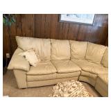 Beige Leather Sectional Sofa with Wear on Armrest