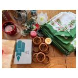 Holiday Decor and Tableware Collection with Candles, Napkins, and Linens