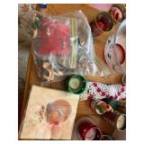 Holiday Decor and Tableware Collection with Candles, Napkins, and Linens