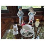 Porcelain Figurine and Teacup Collection with Floral Accents