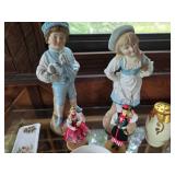 Porcelain Figurine and Teacup Collection with Floral Accents