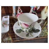 Porcelain Figurine and Teacup Collection with Floral Accents