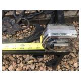 Ornate Black Wrought Iron Outdoor Bench with Floral Design