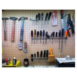 Assorted Hand Tools Collection Including Hammers, Screwdrivers, and Saws