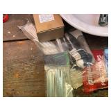 Mixed Garage and Pest Control Lot with Rat Trap, Cable Ties, Bowl, and Garden Fork