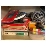 Collection of Workshop Supplies Including Sandpaper, Tape, Foam, and Steel Wool