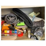 Collection of Workshop Supplies Including Sandpaper, Tape, Foam, and Steel Wool