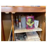 Kitchen Cabinet Contents with Bowls, Cups, Pots, Cleaning Tools and Supplies