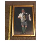 Framed Artwork of Accordian Player in Traditional German Attire