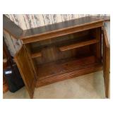 Solid Wood Cabinet with Flip-Top Panels and Interior Shelving