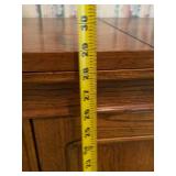 Solid Wood Cabinet with Flip-Top Panels and Interior Shelving