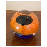 Sabina Rymanow Handcrafted Glass Paperweight with Orange Floral Design