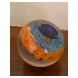 Sabina Rymanow Handcrafted Glass Paperweight with Orange Floral Design