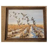 Framed Signed Artwork of Geese Over Cornfield by John