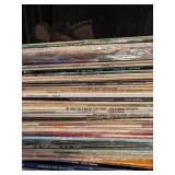 Large Vinyl Record Collection Featuring Various Artists and Genres