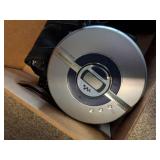 Collection of Vintage Sony Walkman Cassette and CD Players with Accessories