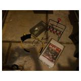 Group of Hunting and Fishing Gear with Slingshot, Target, Map Guides, and Accessories