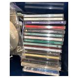 Large Music Media Collection with CDs, Cassettes, and Vinyl Records