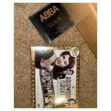 Large Music Media Collection with CDs, Cassettes, and Vinyl Records