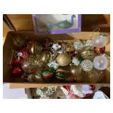 Collection of Christmas Ornaments and Decorative Santa Figures
