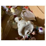 Collection of Christmas Ornaments and Decorative Santa Figures