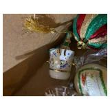 Collection of Christmas Ornaments and Decorative Santa Figures