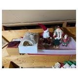Collection of Vintage Santa Claus Figures and Holiday Decor