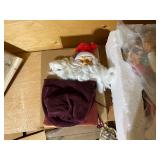 Collection of Vintage Santa Claus Figures and Holiday Decor