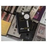 Collection of Cassette Tapes with Unitech FM Stereo Receiver