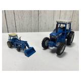 Two Ford Toy Tractors: Ford TW-35 and Front Loader Attachments Two Ford Toy Tractors: Ford TW-35 and Front Loader Attachments