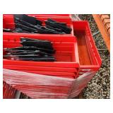 Pallet of Red Industrial Storage Bins with Black Dividers