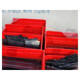 pallet of red plastic storage bins