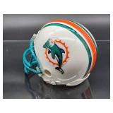 Autographed Mini Helmet by NFL Running Back "Ricky Williams" with COA